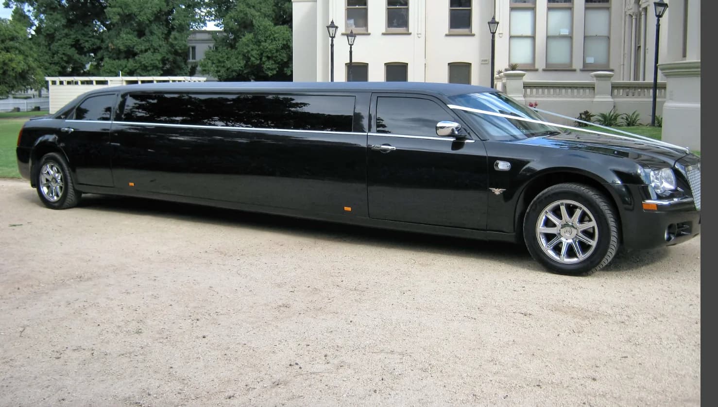 Executive limousine sedan parked on a Sydney street at dusk